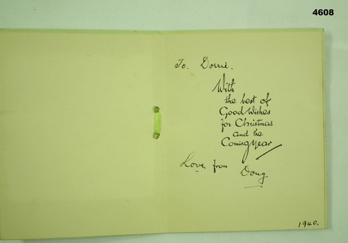 Inside of Christmas card with writing.
