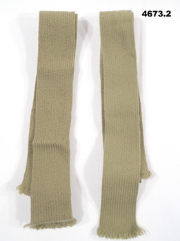 Two khaki colour military issue ties.