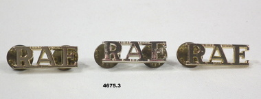 Three R.A.E issue shoulder badges