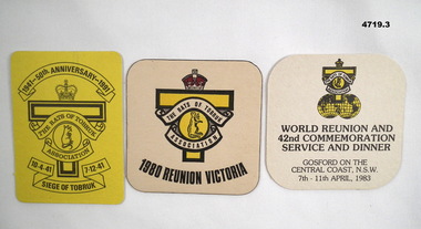 Three souvenir Reunion drink coasters