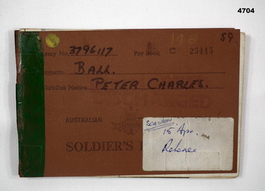 Brown covered soldiers pay book Vietnam era