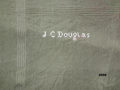 Silk Khaki Handkerchief - close up of name 'J.C. Douglas'.