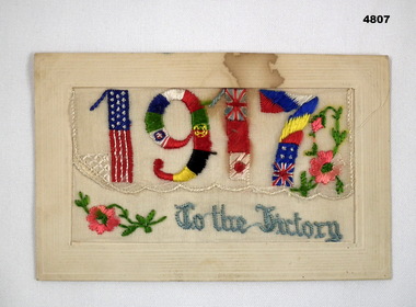 Silk post card embroidered 1917 with flags.