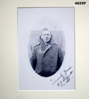 Portrait photograph in mount.