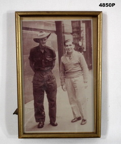 Sepia tone photo of two Australian soldiers.