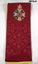 Red stole from a set of four religious stoles consisting of the colours, purple, white, green and red which represent four liturgical seasons.