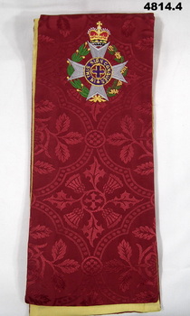 Red stole from a set of four religious stoles consisting of the colours, purple, white, green and red which represent four liturgical seasons.