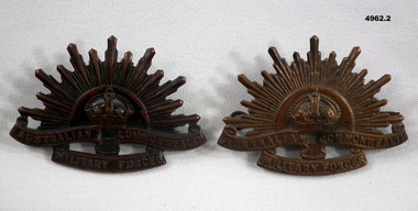 Two Rising Sun badges