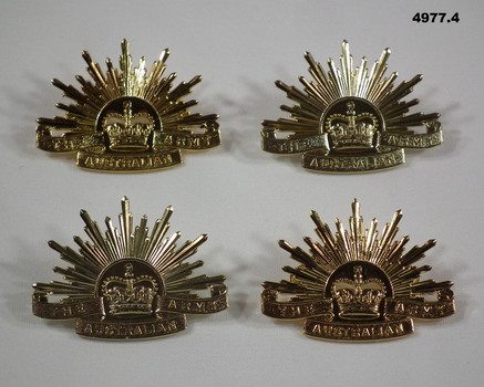 Current issue Rising Sun hat badge with the text 'THE AUSTRALIAN ARMY' on a scroll.