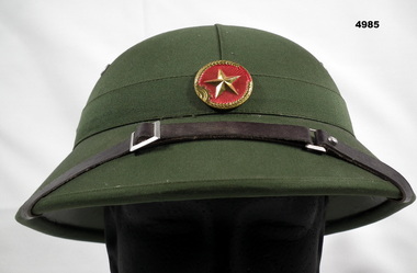 NORTH VIETNAMESE REPLICA HAT WITH ARMY BADGE.