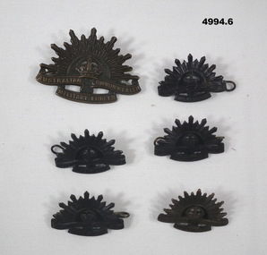 Wartime set of Rising Sun badges.