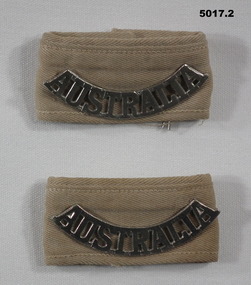 Pair of Australia shoulder badges mounted