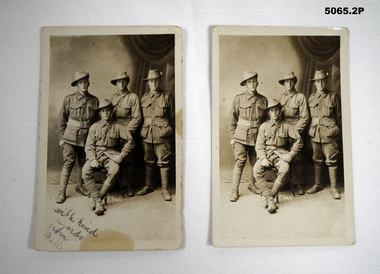 Sepia tone photograph of 4 soldiers in England