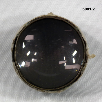 Black metal and glass camera lens.