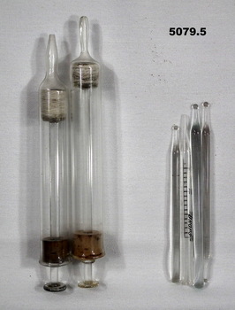 Medical Equipment - syringes and measurement pipettes.