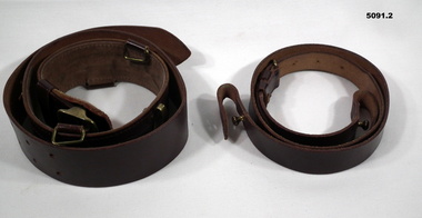 Leather belt for trousers and "Sam Browne".