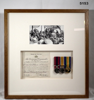 Medals, certificate, photo re award of the DCM.