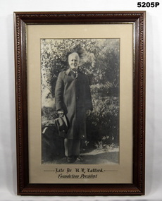 Framed full length portrait of Dr. H. R. Catford.