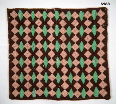 Geometric wool embroidered pouch - silk lining.