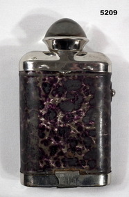 Pocket torch shaped like a flask.