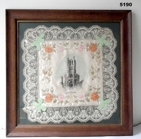 Framed embroidered silk and lace cloth.