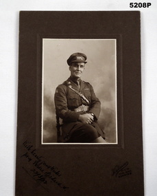 Photograph - half portrait of Padre W. Rickard in uniform.