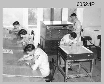 Technicians scribing reproduction material at the Army Survey Regiment c1950s