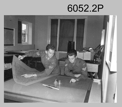 Technicians scribing reproduction material at the Army Survey Regiment c1960s
