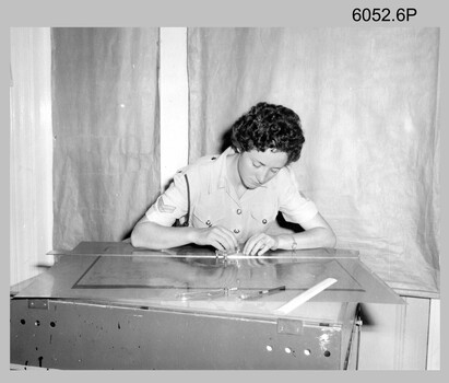 CPL Jennifer Murray scribing linear feature at the Army Survey Regiment Oct 1961