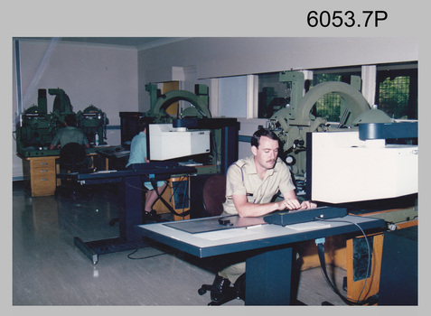 L to R: unidentified (x2), SGT Sandy Craig capturing topographic features with Wild B8 workstations in AUTOMAP 2 c1994.