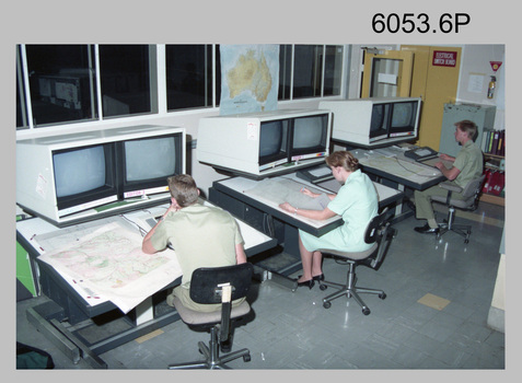L to R: unidentified, SPR Rachel (Stanford) Scott, CPL Chris Wynn operating AUTOMAP 2 Graphic Edit Workstations c1994.