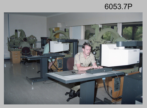 L to R: unidentified (x2), SGT Sandy Craig capturing topographic features with Wild B8 workstations in AUTOMAP 2 c1994.