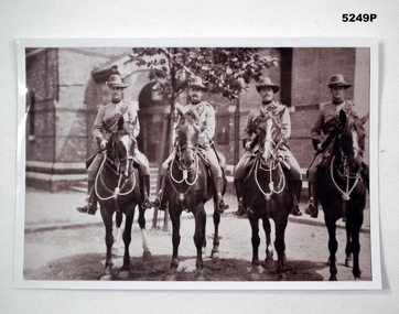 Photograph of four Victorian Mounted Rifles troops.