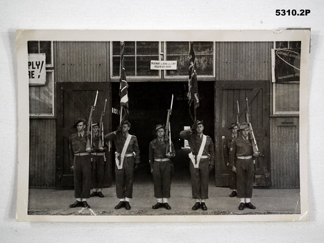 Two photos of 38th Battalion soldier's Colour Party.
