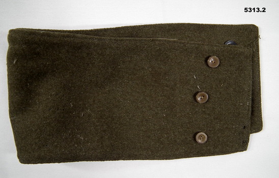 Khaki wool Gaiters with buttons.