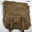 Brown canvas bags with metal studs and buckles.