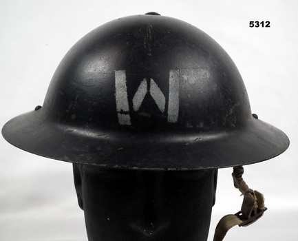 Black Tin Helmet with a black plastic insert.