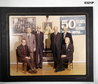 Photo of six men at a Legacy Function.