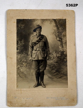 Photo of a soldier with bandolier and leather gaiters