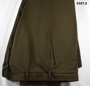 Two pairs of Khaki army issue polyester and viscose service dress trousers.