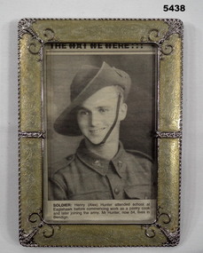 Newspaper picture of soldier ww2 framed.