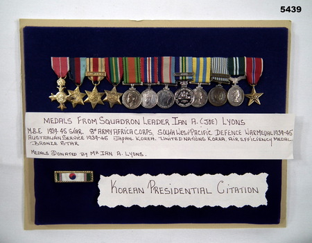 Set of twelve miniature medals and a separate citation bar.