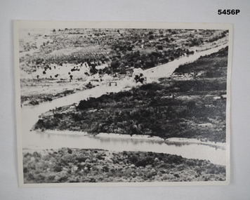 PHOTOGRAPH OF BRIDGE BEING BOMBED WW2