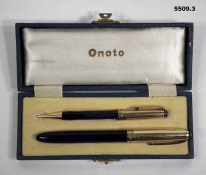 Pen and pencil set in a blue coloured presentation box.