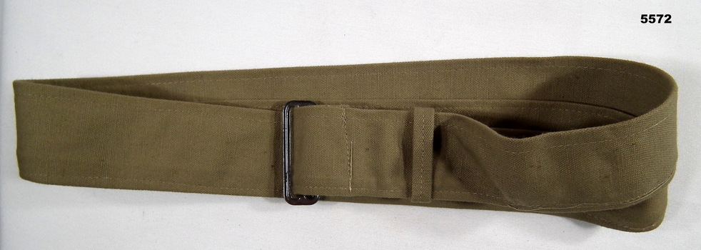 Khaki coloured cotton fabric belt with buckle.
