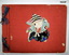 Heavy red photo album with photographs WW2
