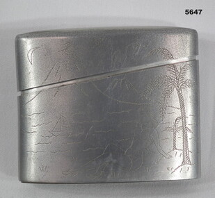 Cigarette case engraved with Japanese symbols.