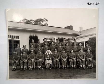Photo, group of soldiers with a nurse.