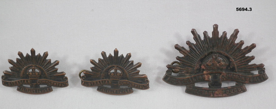 Three Rising Sun hat and shoulder badges.