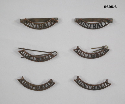 Six Australia Uniform Badges.